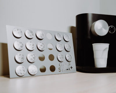 Steel coffee holder for coffee capsules